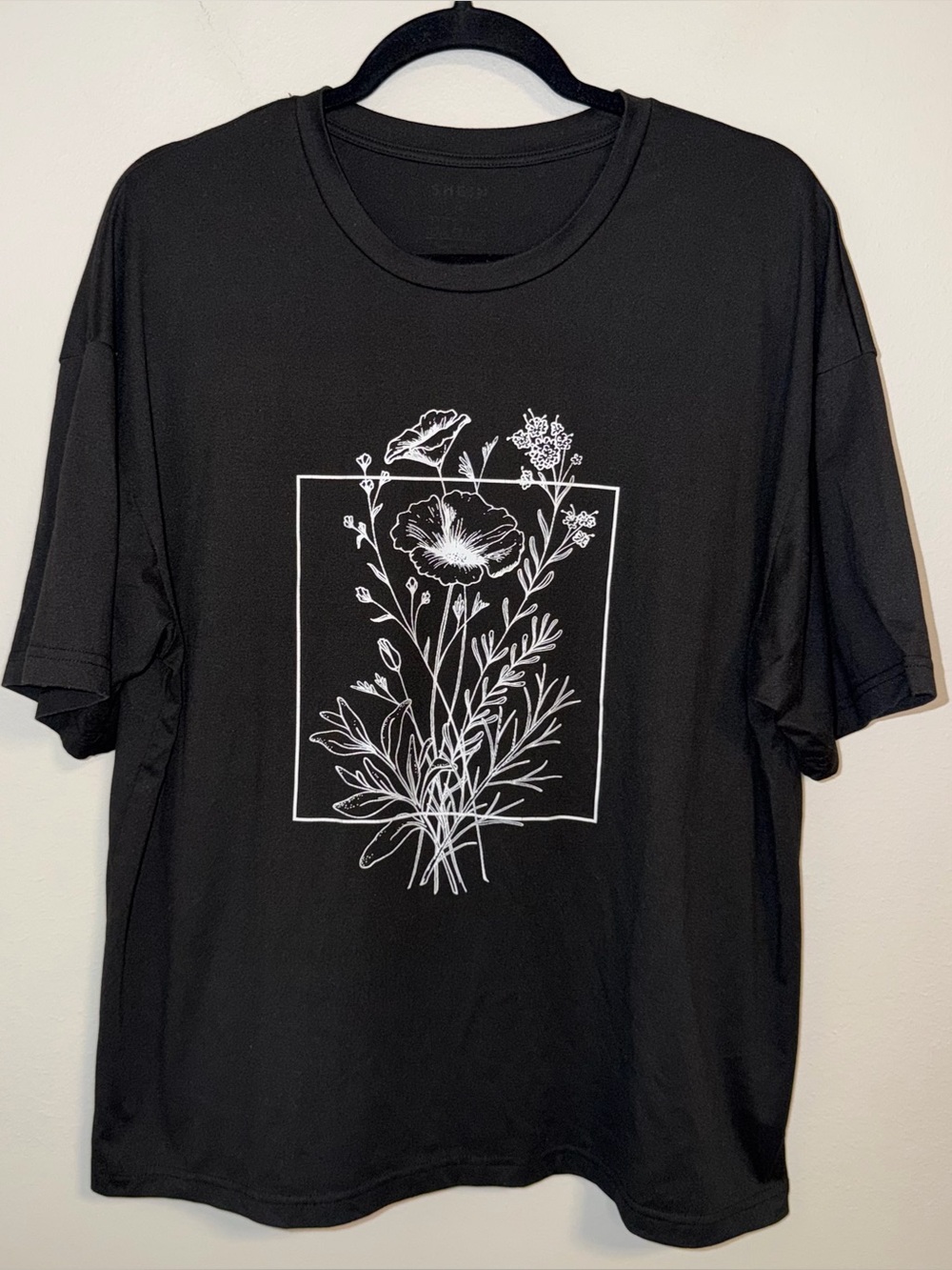 SHEIN Black Short Sleeve Tee with White Floral Graphic
